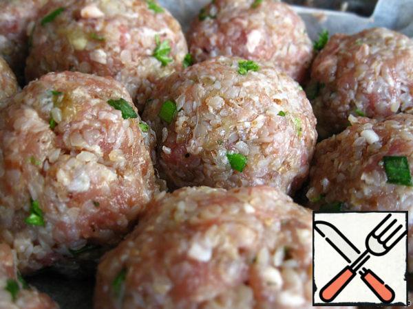 Roll the ball. I got 20 of these balls. Put it in a baking dish.
