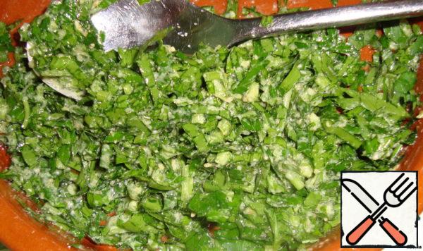 Make the stuffing. Finely chop the greens. Add finely chopped garlic + mustard + vegetable oil and salt to taste.