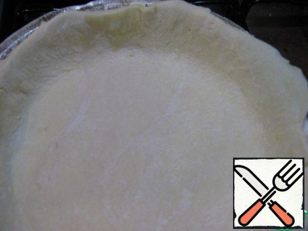Unfreeze the dough, roll out and put in a form that were bumpers.