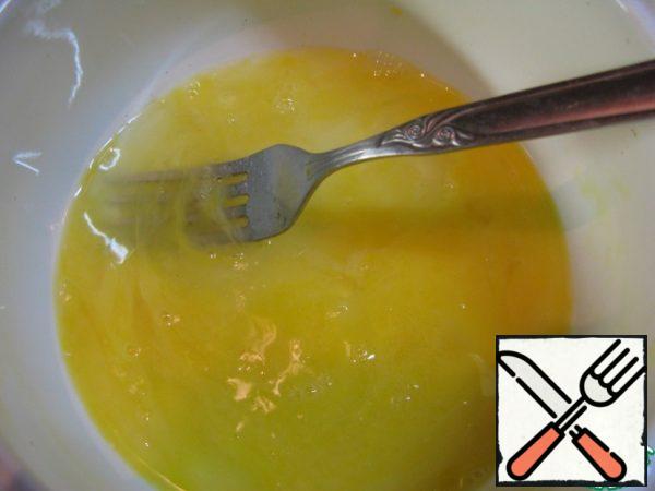 Beat eggs with a fork with 1 tsp water.