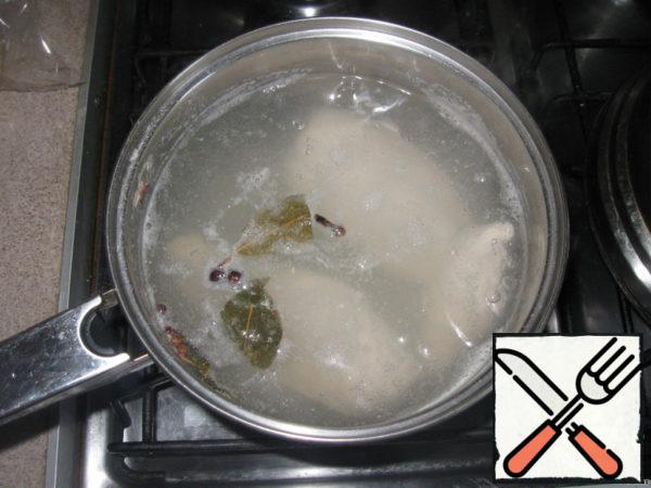Cook chicken fillet in salted water (I add Bay leaf, black pepper and cloves).
