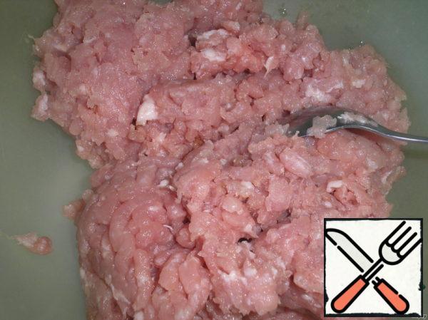 Place the Turkey minced meat and the pork minced meat in a bowl.