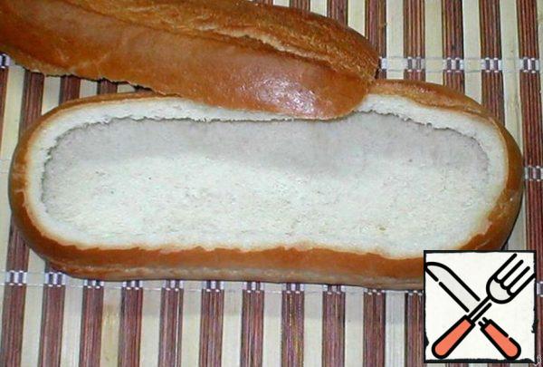 Take a loaf of white bread, cut the top crust, remove the crumb, leaving only 1-1. 5 cm from the crust.