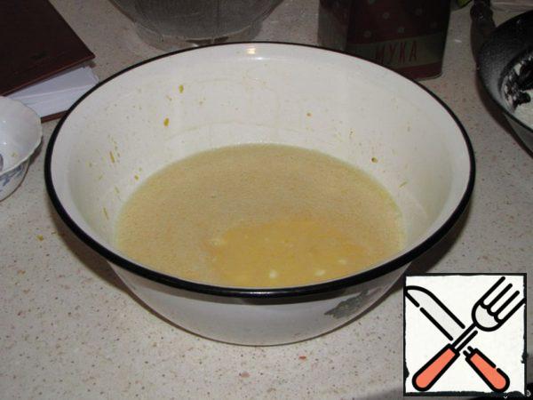 Add the oil, mix thoroughly at medium or low speed mixer, add sour cream and mix everything thoroughly again.