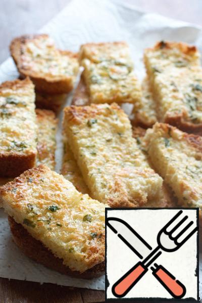 Slightly cooled slices cut into small pieces. The bread turns out crispy, browned, flavorful! Even tastier than everyone's favorite cheese sticks.