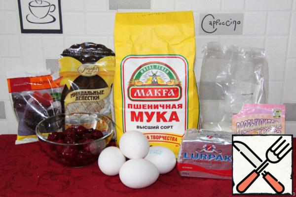 Our products: thawed cherries, flour, butter, eggs, sugar, powdered sugar, baking powder and almond petals.
