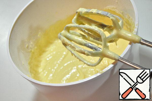 Melted, cooled butter grind with sugar.
Add eggs, stir.
In the oil mass add flour with baking powder, stir.