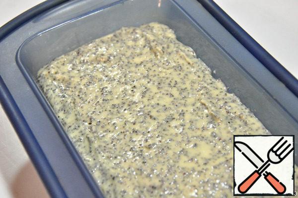 Put the dough with poppy seeds on top, do not mix.
Put the form in a preheated oven to 180*. Bake for about 1 hour.
The size of the cake mold is 21 cm by 8 cm.