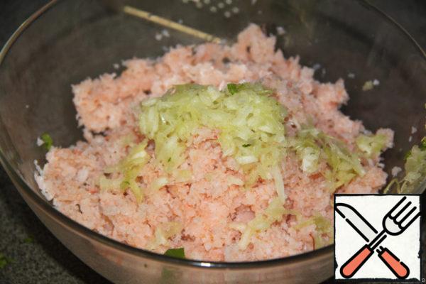 Grate the celery and add to the minced meat.