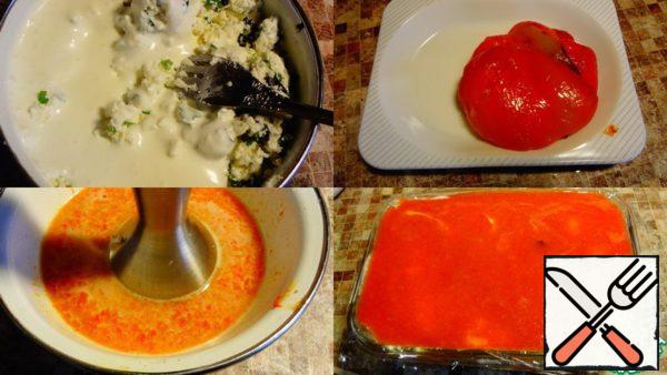 Take 100g. fat cream, a little whisk and add to the feta cheese.
Heat the remaining half of the broth and dissolve the remaining gelatin in it.
Half of the broth to enter in with cream cheese and olives.
The broth that was left, put the remaining chopped roasted and peeled the skins from the peppers, and pushing a hand blender.
Pour the white layer with feta cheese on the frozen transparent layer.
Top gently pour the third layer, red, pepper puree.
Stir a little with a toothpick to get stains in the last two layers.
Put in the refrigerator until solidification.