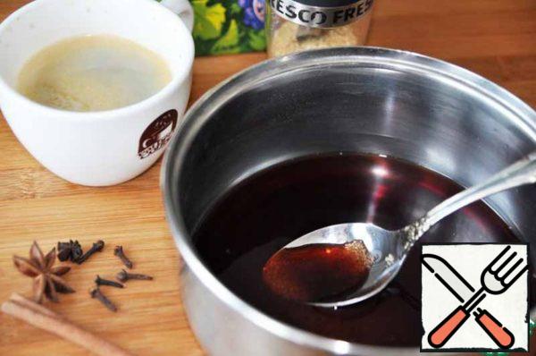 In  saucepan pour the red wine, do not have to take the hon.
Add sugar, I prefer brown.
Pour the brewed coffee, add spices and heat until the sugar dissolves.