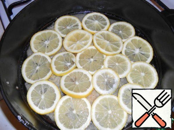 Sometimes I leave the peel on the lemon, and sometimes I slice it as much as possible. I like the bitterness it gives.
