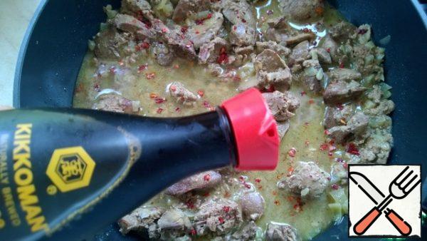 Add the soy sauce and simmer, stirring frequently, for 10 minutes or until the liquid has evaporated. Do not over-dry so that the liver remains soft.
