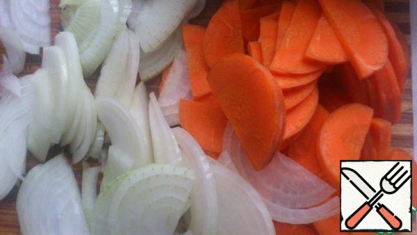 Onion, pepper, carrot (usually in this dish the carrots are added) half rings or rings.
