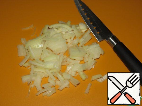 Peel and chop the onion.