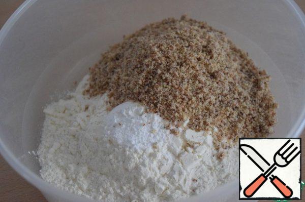 Mix flour, almonds and baking powder.