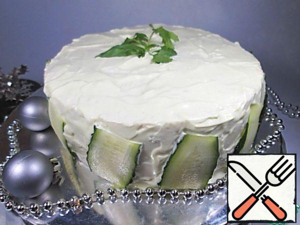 Garnish with cucumber slices and green leaves.