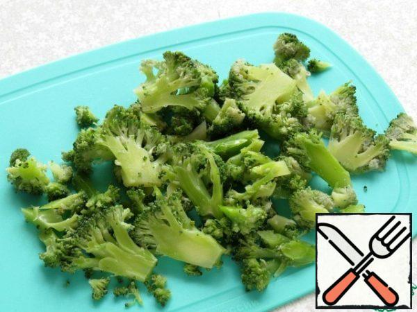 Thinly sliced broccoli.