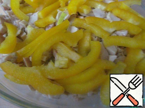 Then cut the bell pepper into strips.
