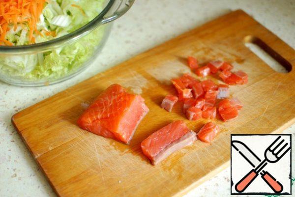 Cut the fish into small pieces.
