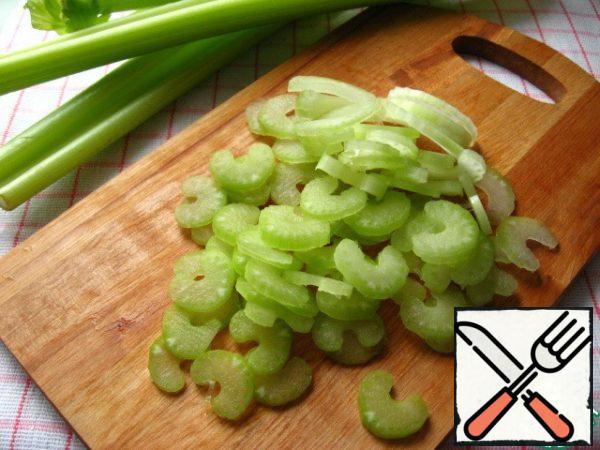 Thin slices cut celery.