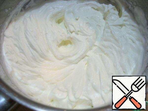Meanwhile, whisk the cream... (200 ml)