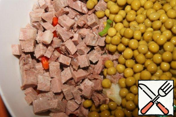 Add the sliced boiled tongue and peas.