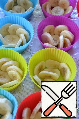 Bananas cut into circles and put in molds for cupcakes.