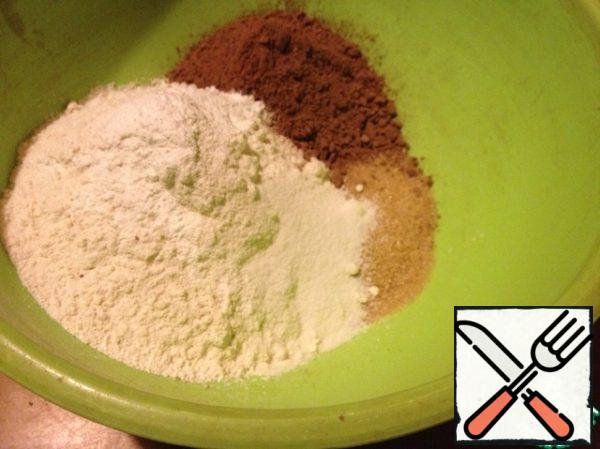 Mix flour with baking powder. Add cocoa, sugar and mix.
