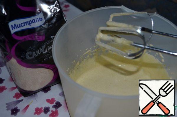 Beat the yolks with sugar until smooth.

