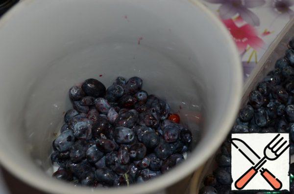 Chop the berries with a blender.

