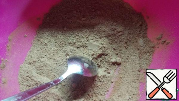 Mix cocoa and flour. At this stage, you can add other spices that you like.