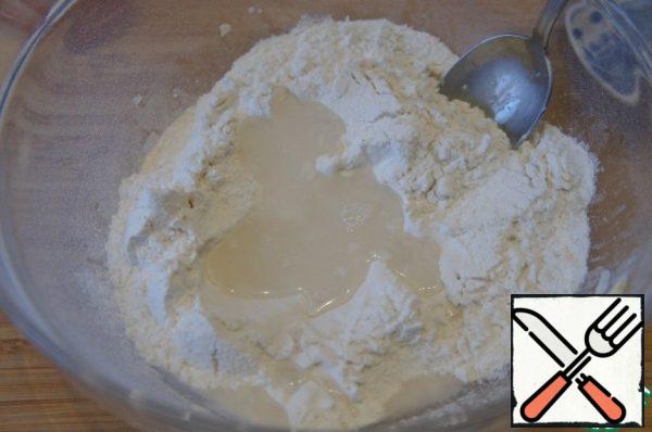 Add water, flour and salt, knead the dough.