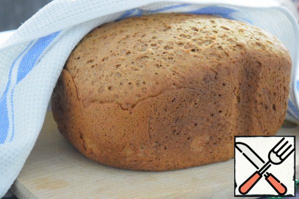 At the end of the program, take out the bread, wrap it in a towel and let it cool completely.