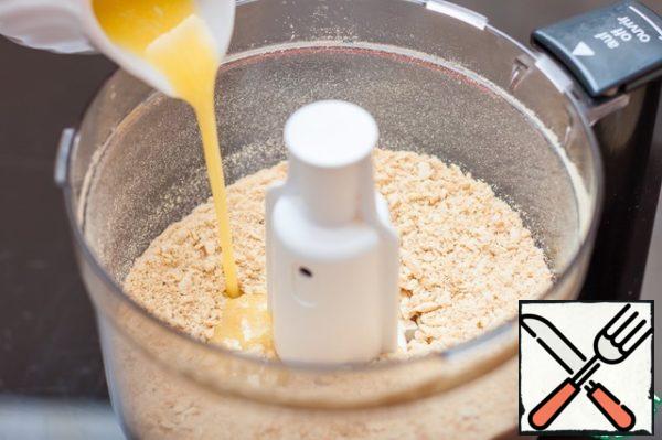 Pour in the melted butter, whisk again.
