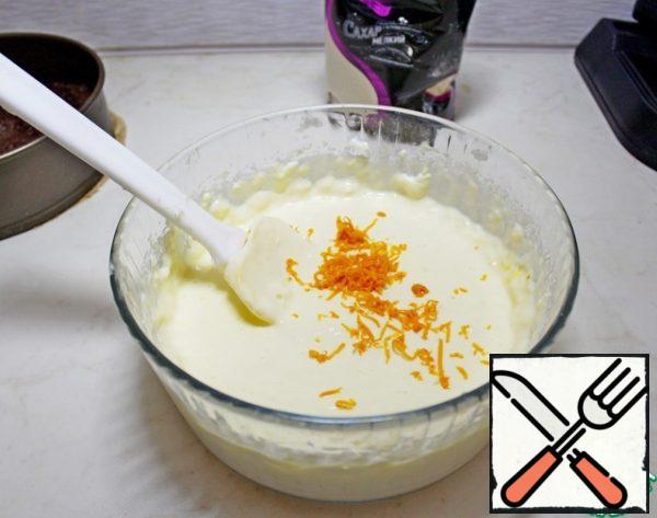 Add the zest of one orange and mix.