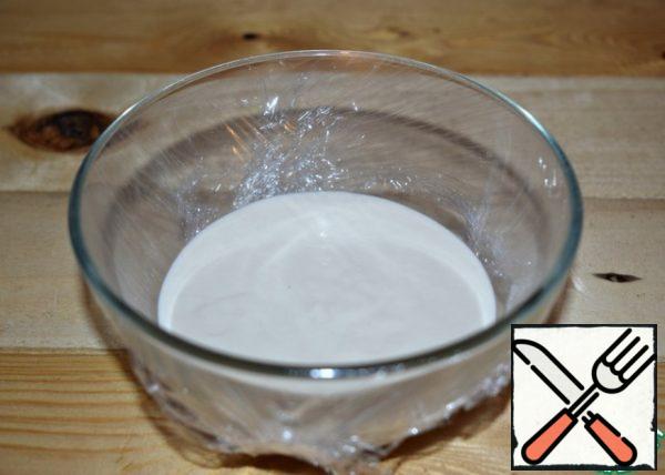 For leaven dough dissolve yeast in water, mix with sifted flour. Capacity with sponge tighten with cling film and put in a warm place for 10-12 hours (at night).
