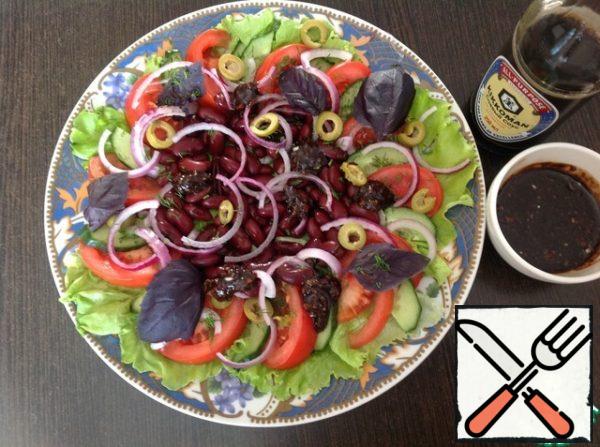 Season the salad and serve.