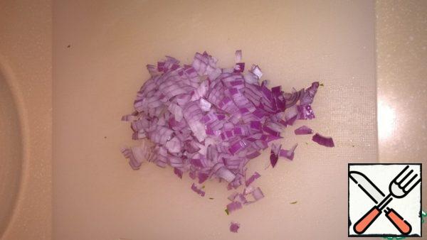 Finely chop onion and add to beans.