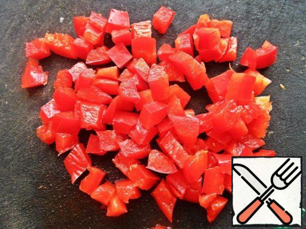 Cut red pepper into small pieces.