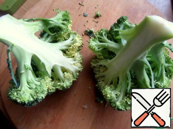 Separate the broccoli from the base.