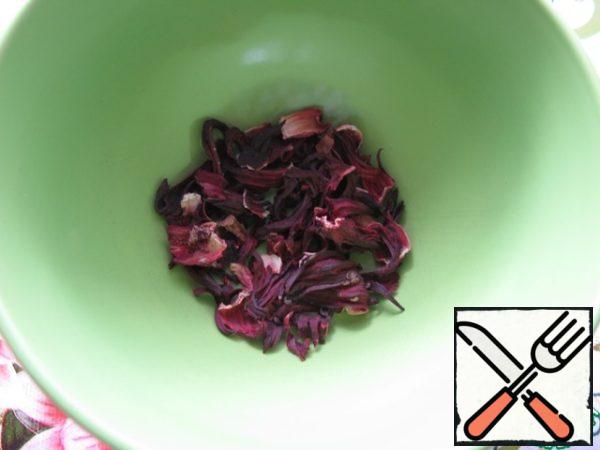 Measure out 1.5 tablespoons of hibiscus.
