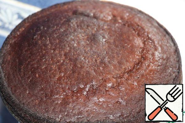 Bake at 180 degrees for 45-50 minutes. Soak the finished cake with 100 ml of orange juice, cool.
