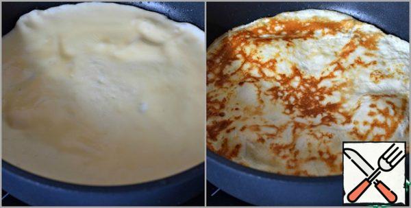 Beat the eggs with cream (milk) until smooth. Add salt.
Fry the omelet in well-heated vegetable oil. (2 minutes on each side) Let the omelet cool.
