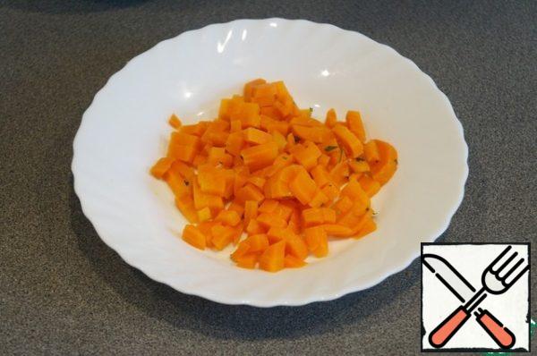 Boiled carrots cut into small pieces.