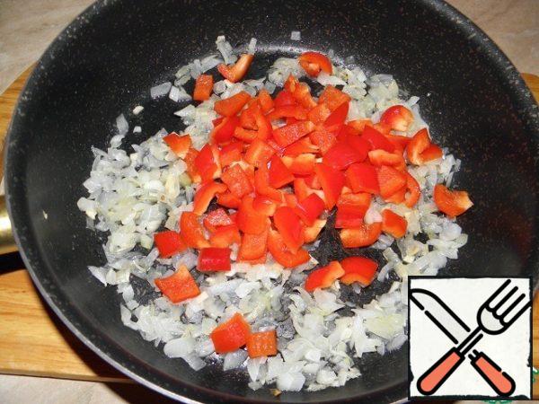 Then add the sweet pepper cut into small cubes .