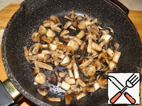 Mushrooms cut not very finely and fry until tender in vegetable oil.