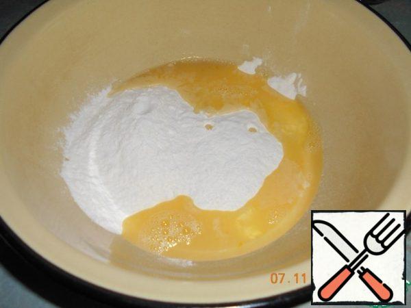 Mix egg with 0.5 tsp salt and 50 ml water, pour into flour.