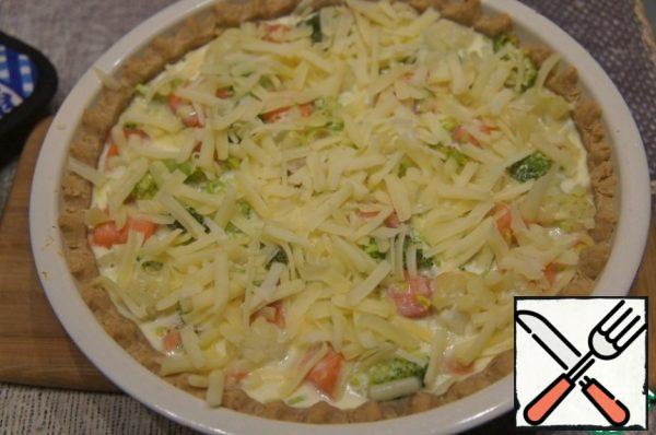 Put in a hot oven (180 * C) for 20 minutes. Then take it out, sprinkle with grated cheese and bake in the oven again until the cheese is ready and browned.
