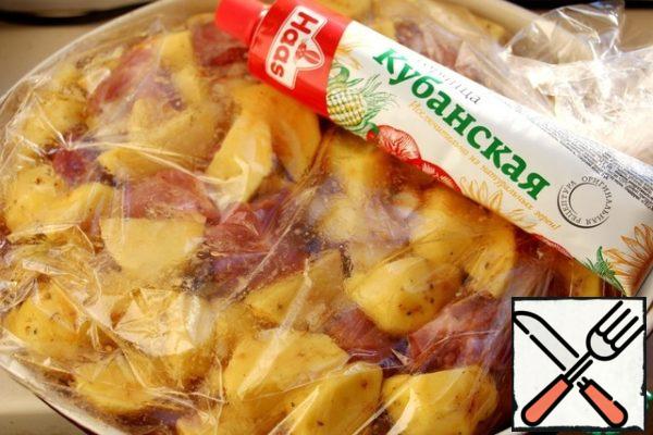 In potatoes with meat and onions, add the finished sauce, put in a baking bag, tighten the clips at the ends, make 4 punctures on top and bake at 180 degrees for 50-60 minutes.